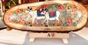 Cows and lotuses at wooden tray with stand.